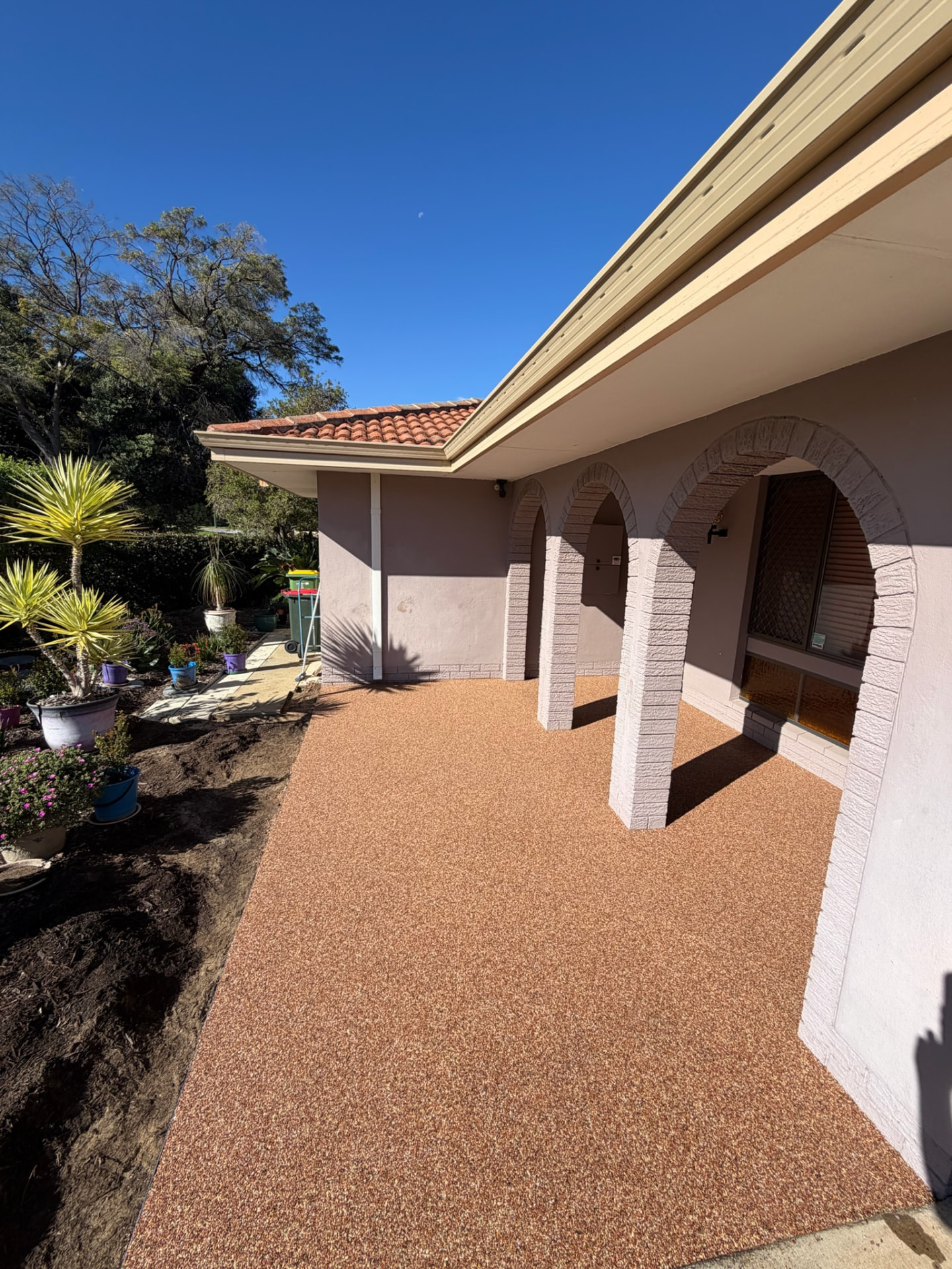 Terracotta resin bound entrance pathway Perth with arched porch