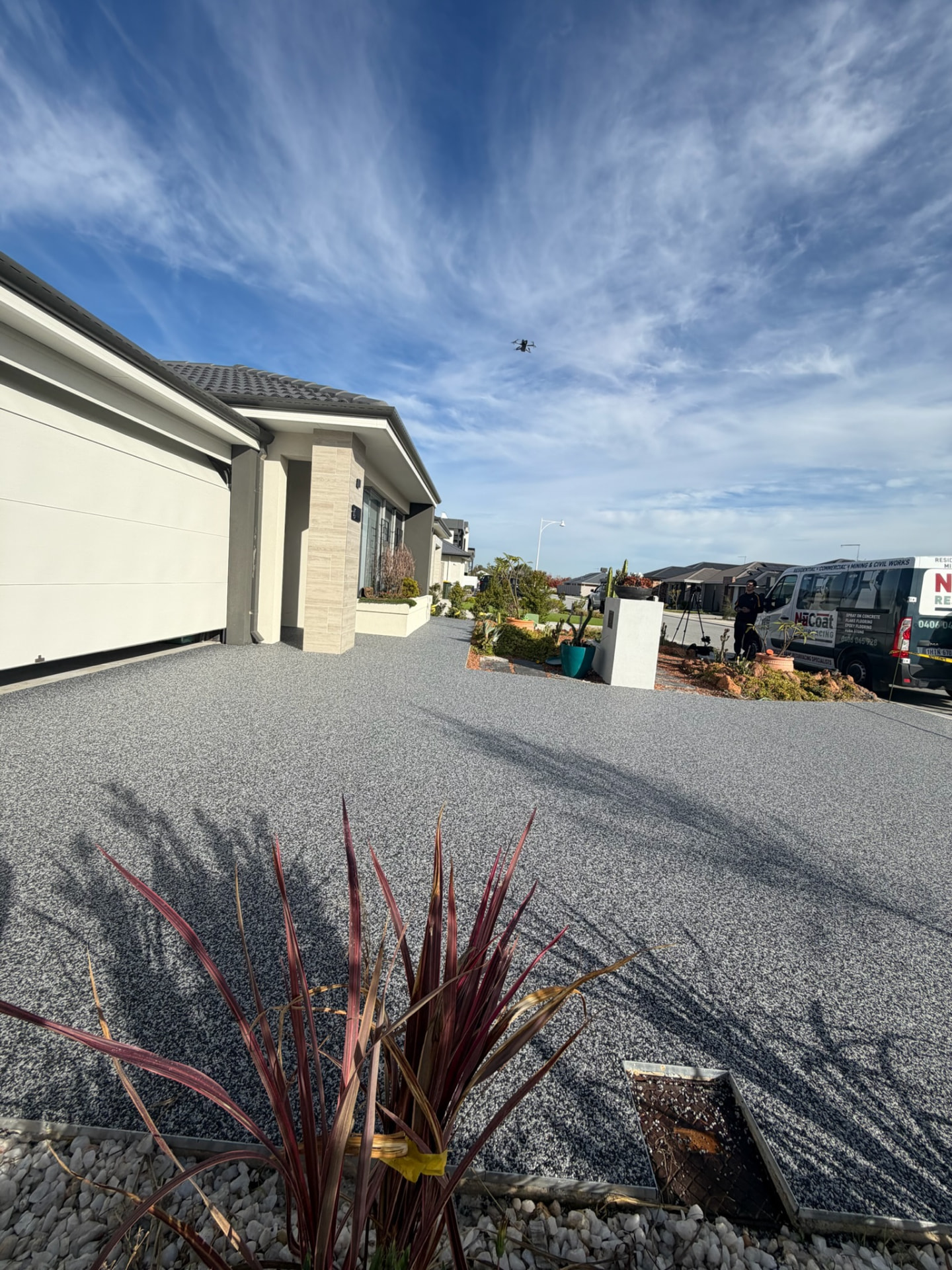 Completed grey resin bound driveway Perth new build home