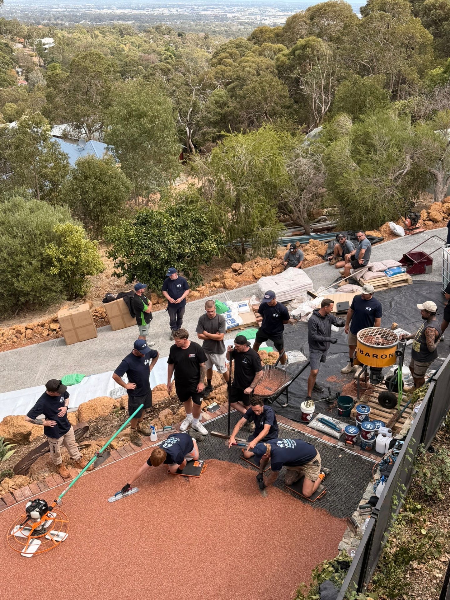 Team working on large resin installation