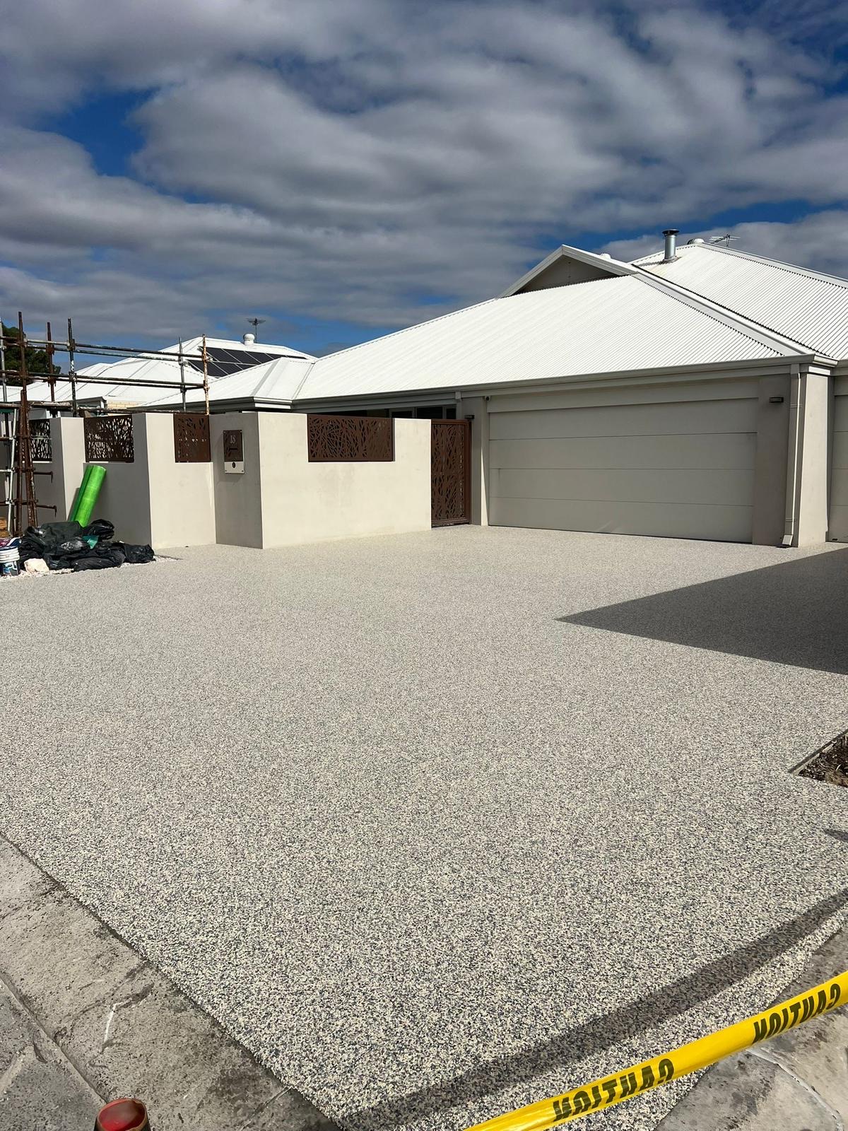Completed resin driveway with garage