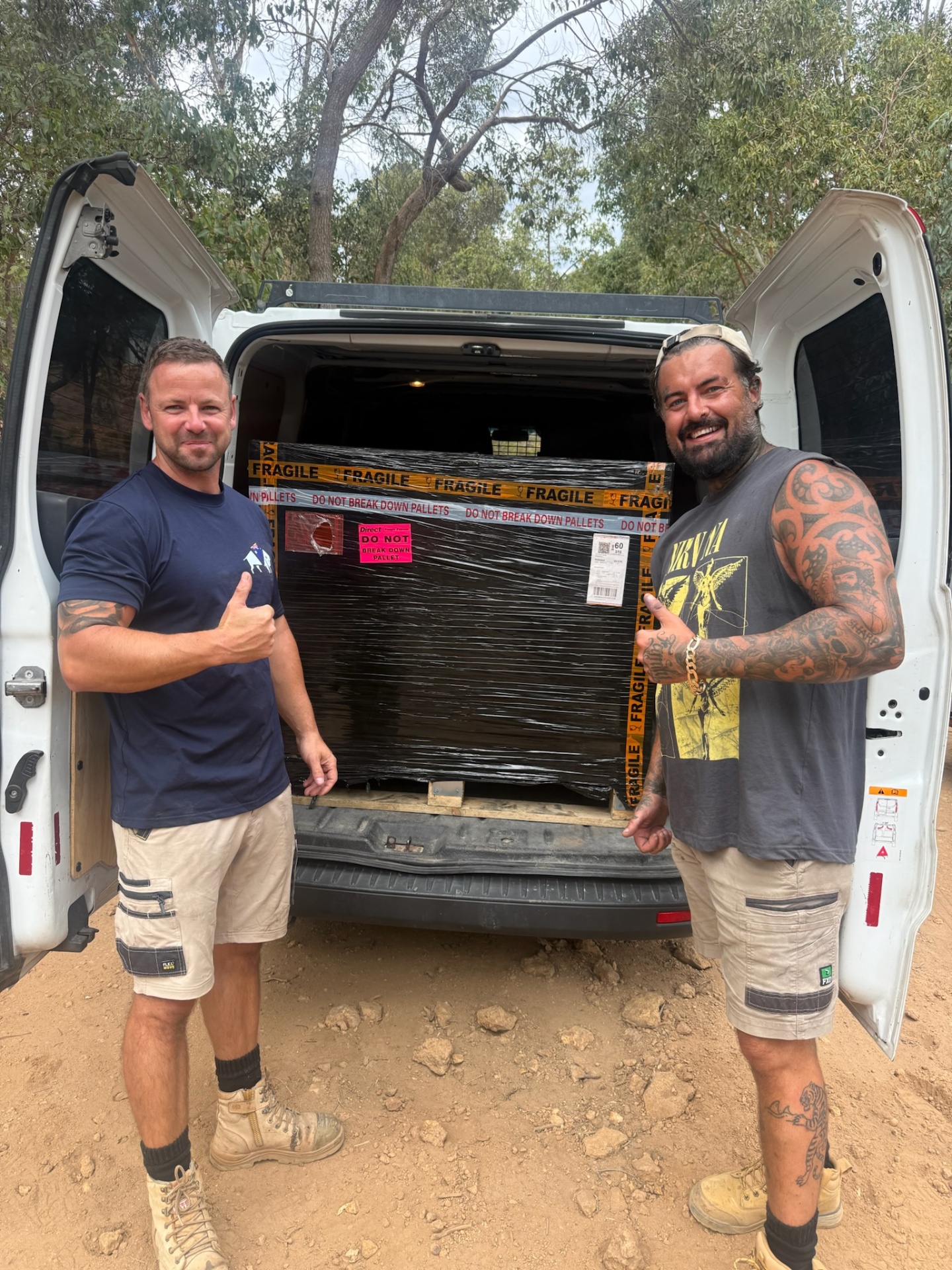 Team with delivery van loaded with materials