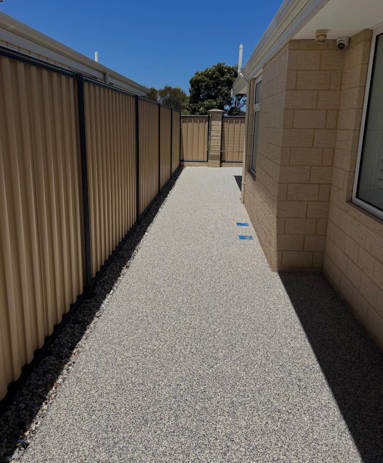 Resin bound side pathway between fence and house
