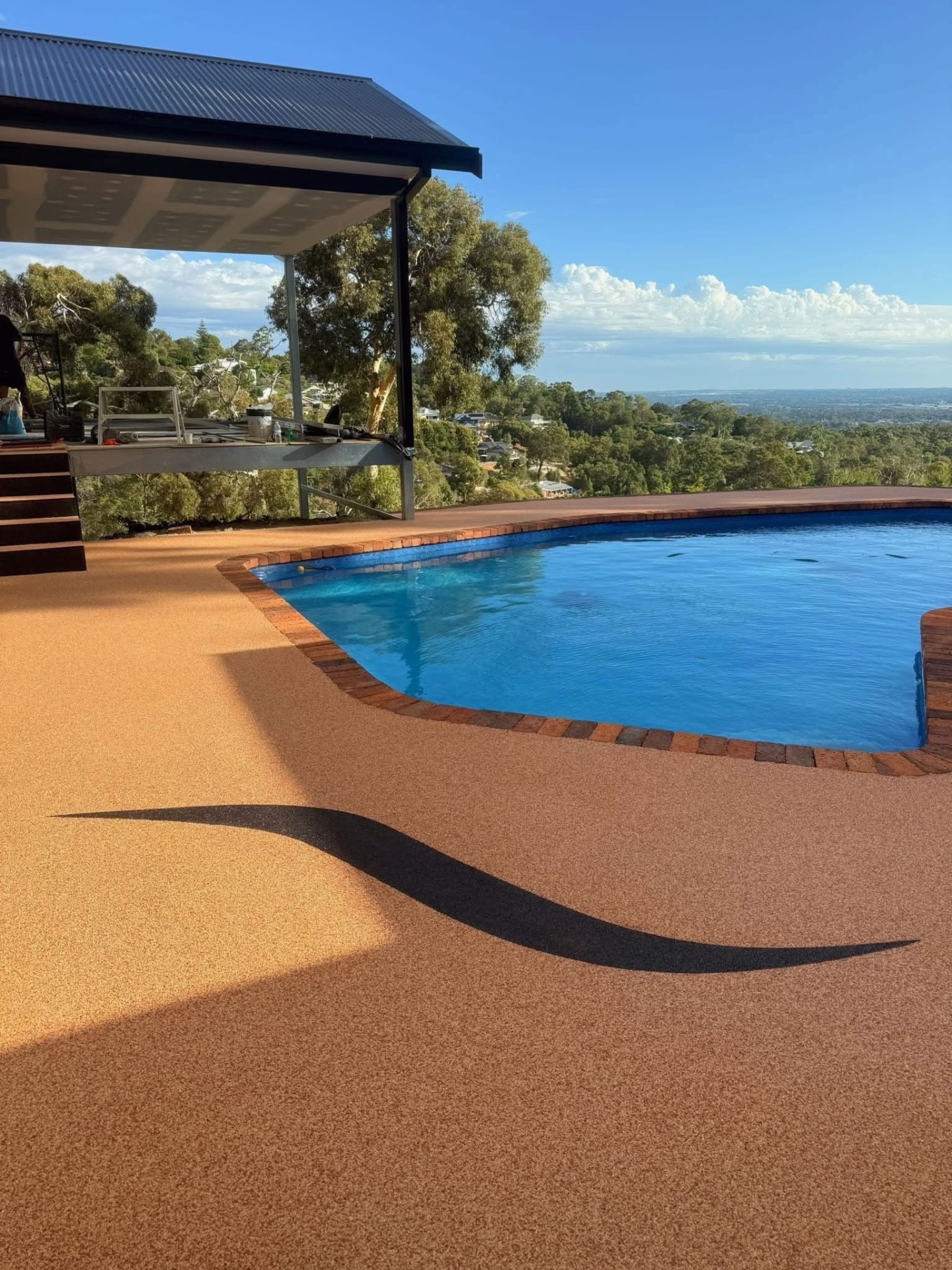 Resin bound pool surround with hilltop views