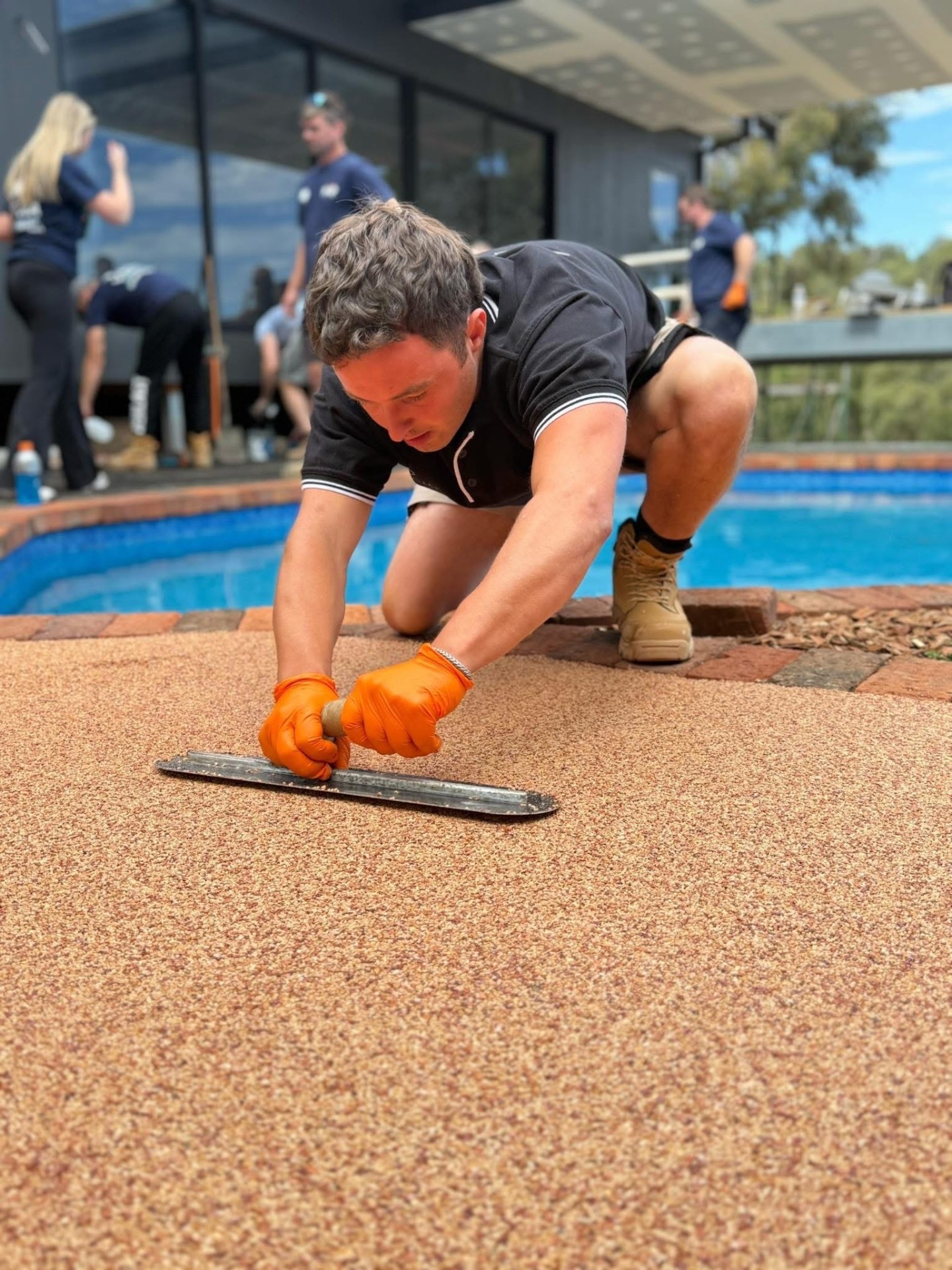 Vuba installer detailed hand trowelling pool edge