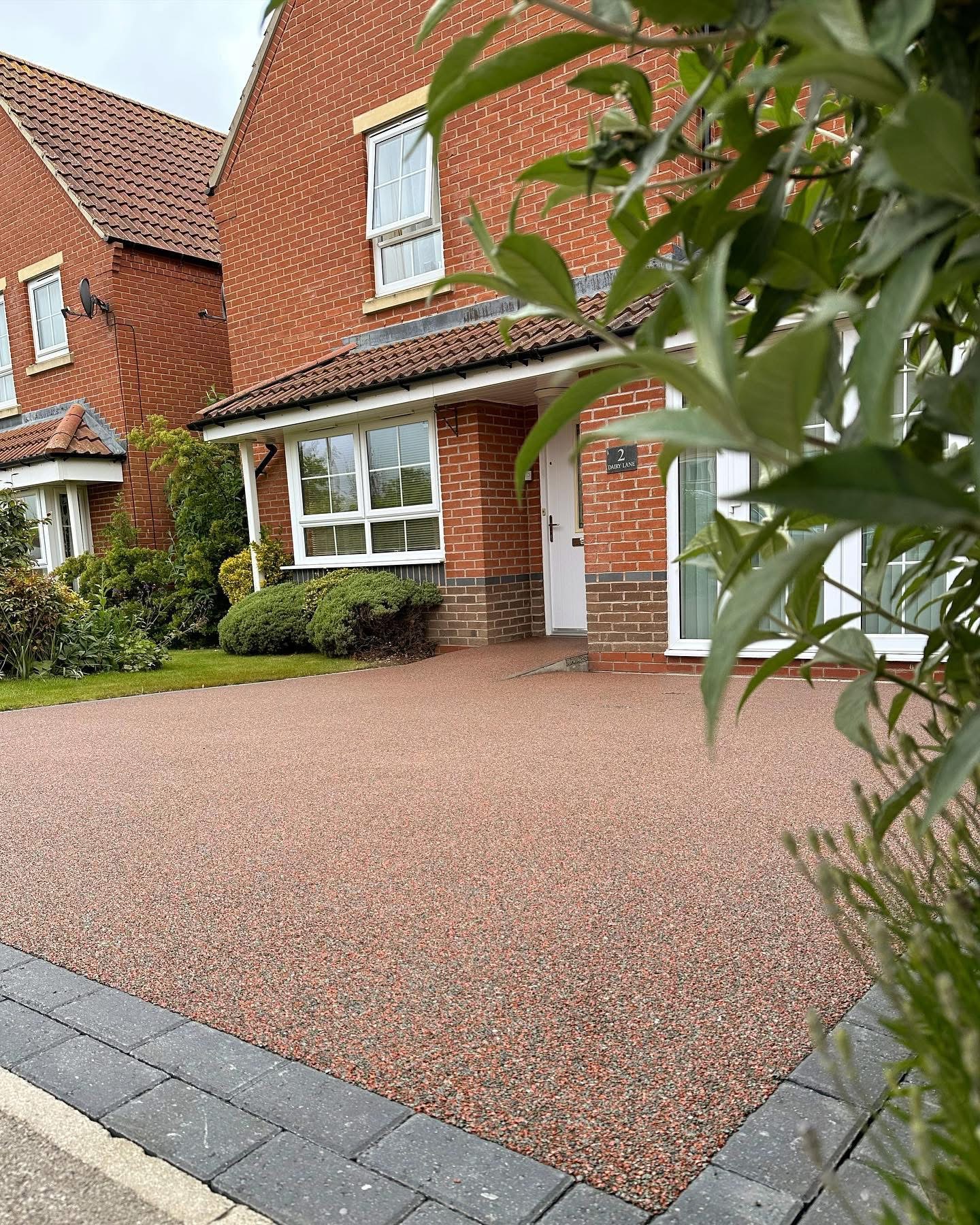 Reddish resin bound driveway
