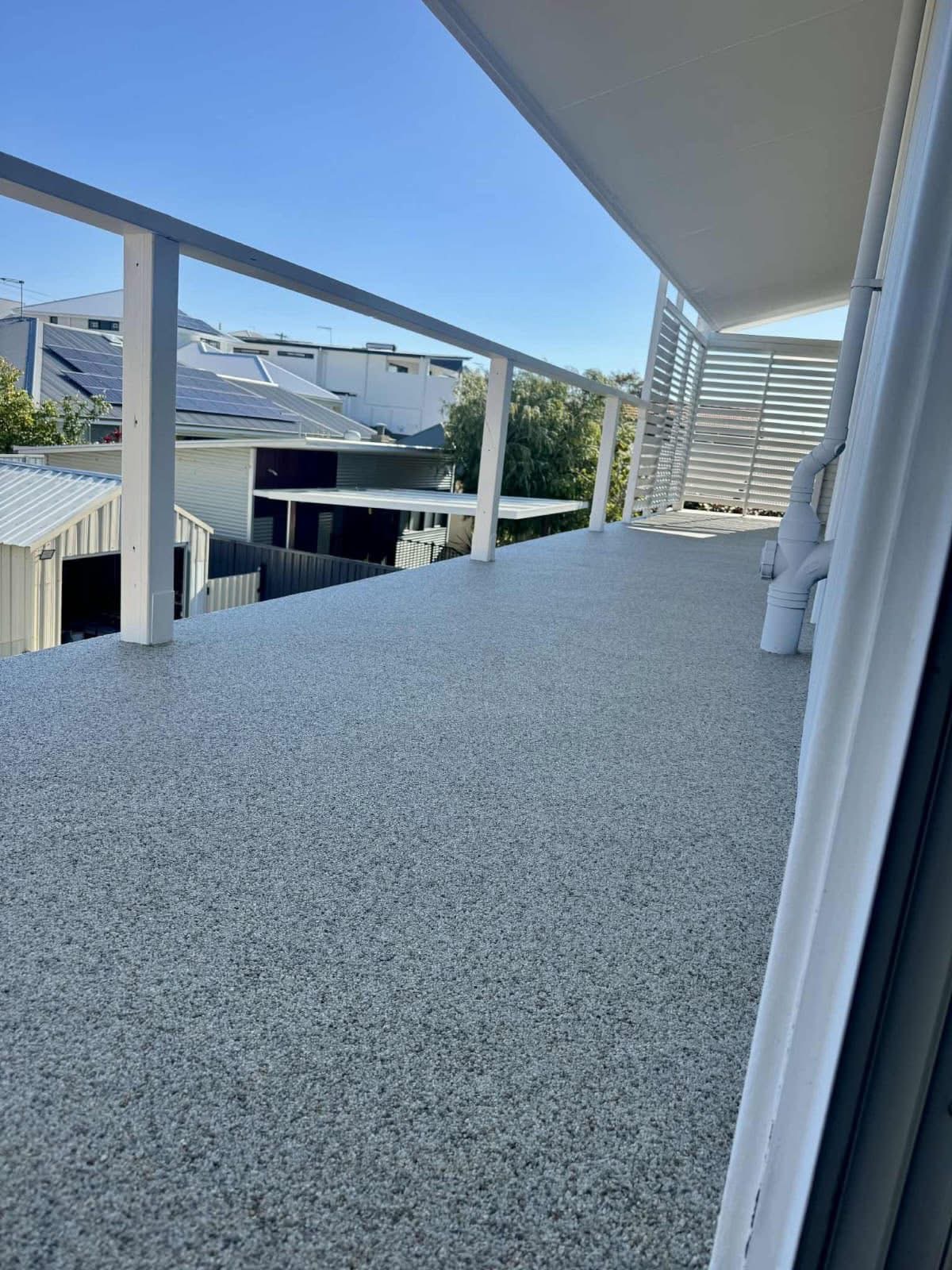 Long balcony with resin bound surfacing