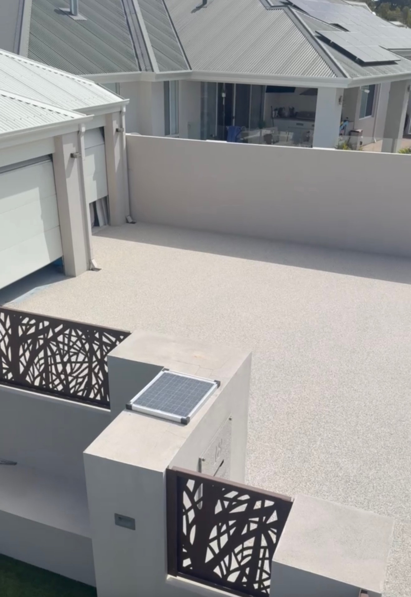 Aerial view of cream resin bound driveway Perth modern home