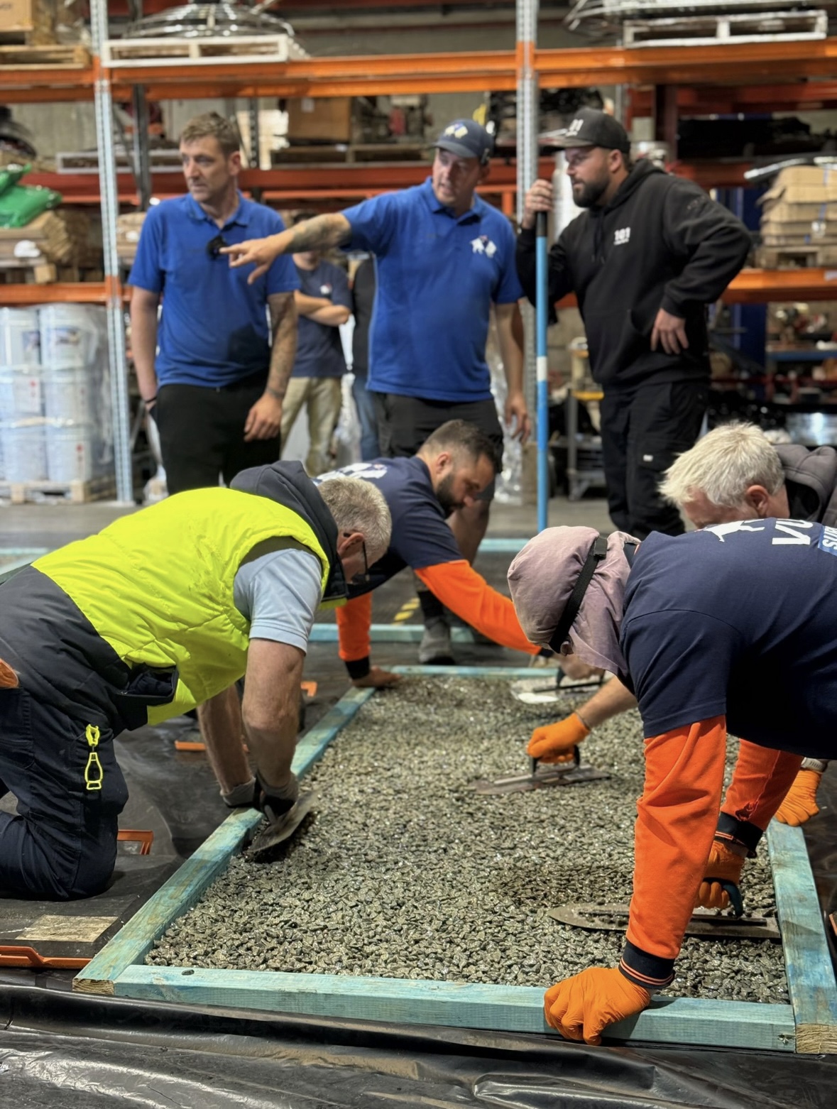 Hands-on resin trowelling in warehouse training